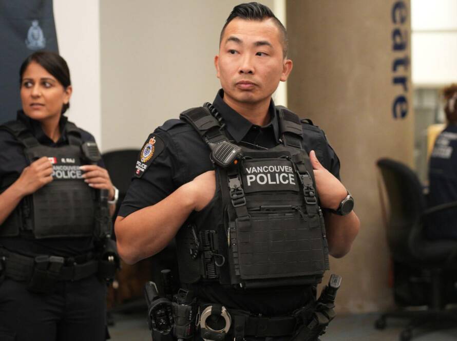 Police officers preparing gear representing how to become a CBSA officer